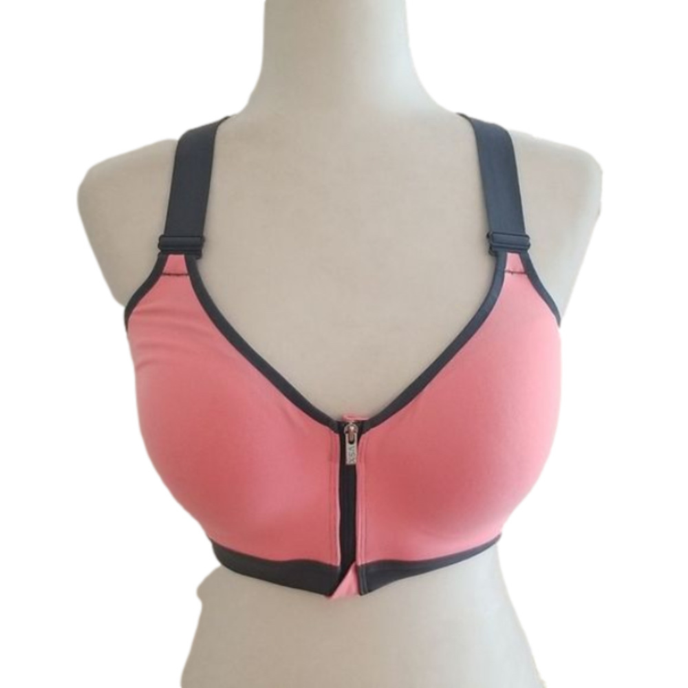 Victoria’s Secret VSX Sport padded sports bra, size 34D, front zip closure.